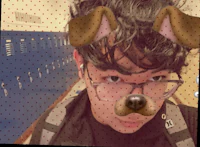 a boy with glasses and a dog on his face